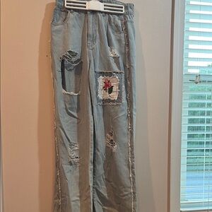 Distressed Striped Jeans with Floral Patch